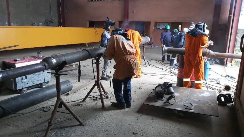 Supanova fabrication team working in a project workshop