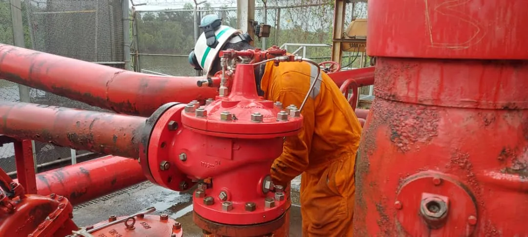 Supanova construction technician working on a valve installation