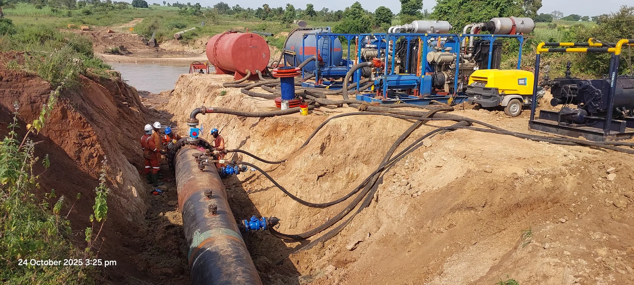 Supanova pipeline pre-commissioning equipment operating at a field site
